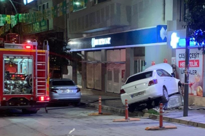 Kontrolden çıkan otomobil iş yerinin duvarına çaptı