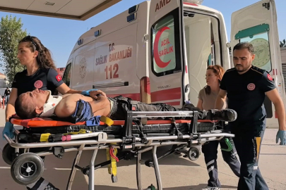 Cam fabrikasında işçi makineye sıkıştı