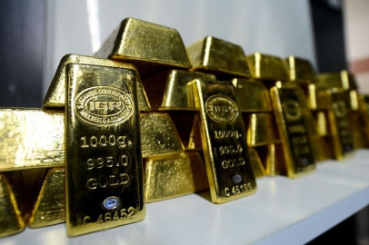 Altının ons fiyatı ticaret gerilimlerinin azalmasının ardından kar satışlarıyla geriledi