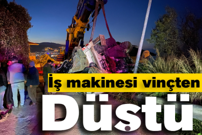 Bursa'da iş makinesi vinçten düştü
