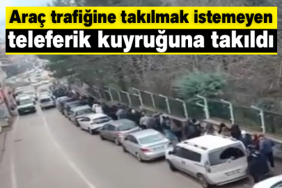 Araç trafiğine takılmak istemeyen teleferik kuyruğuna takıldı