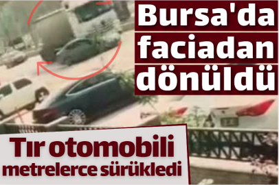 Bursa'da faciadan dönüldü: Tır otomobili metrelerce sürükledi