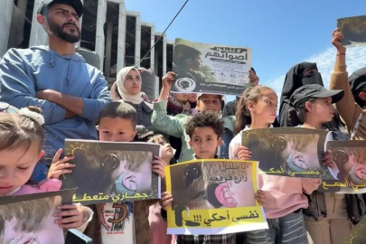 Gazze'de işitme engelli çocukların aileleri, İsrail ablukasının son bulması için eylem yaptı