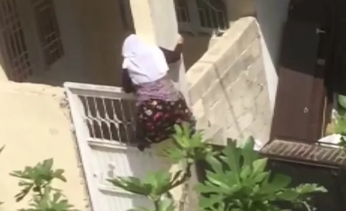 75 yaşındaki kadın karantinadan sıkıldı,duvara tırmanıp kaçmaya çalıştı!