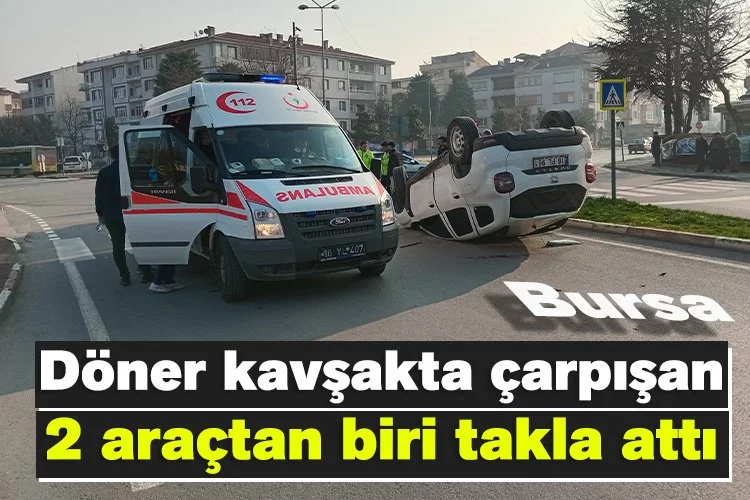 Bursa'da döner kavşakta çarpışan 2 araçtan biri takla attı