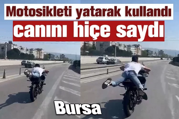 Bursa'da motosikleti yatarak kullandı, canını hiçe saydı